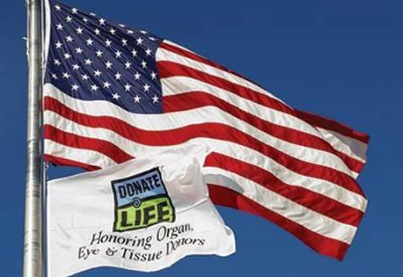 American flag next to donate life flag